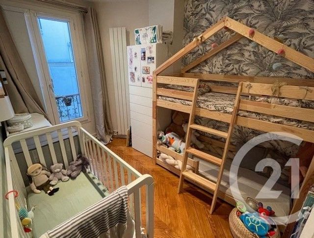 Afficher la photo en grand Appartement F3 à vendre - 3 pièces - 65.46 m2 - PARIS - 75018 - ILE-DE-FRANCE - Century 21 Calmette